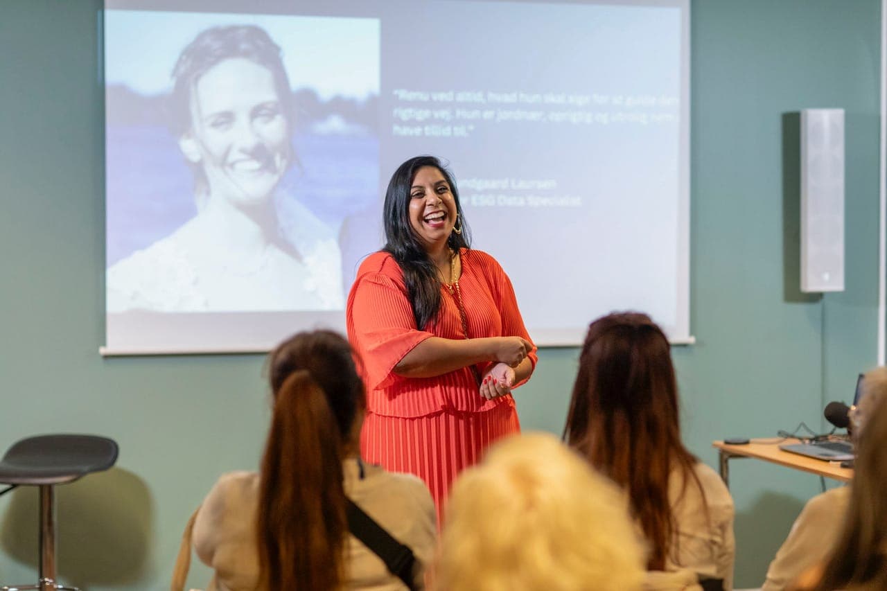 Renu Sharma coaching a live session on stage